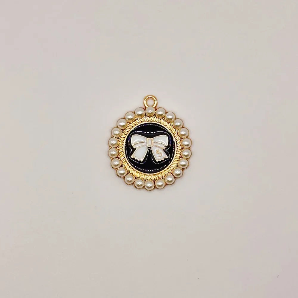 Pearl Bow Pendant