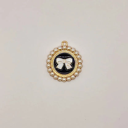 Pearl Bow Pendant